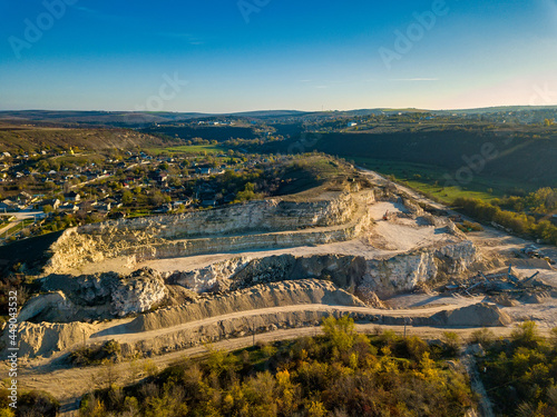 Stone Quarry Aerial. Heavy machinery working at stone qaurry.