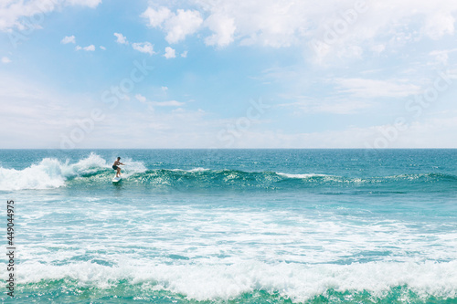 Surfer on the ocean waves.