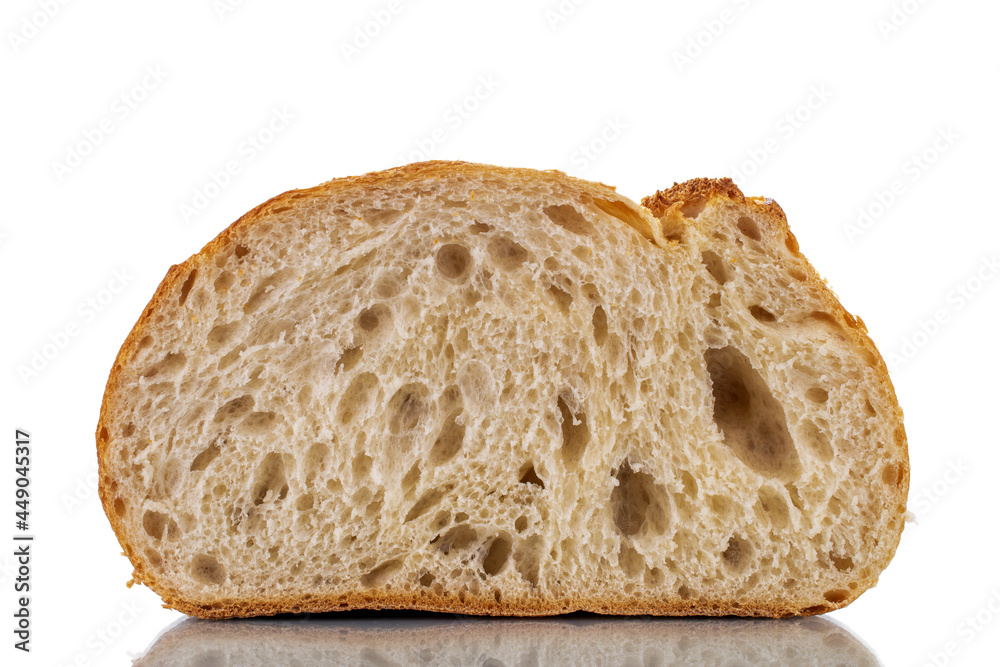 One halves of fragrant white bread, close-up, isolated on white. One halves of fragrant white bread, close-up, isolated on white.