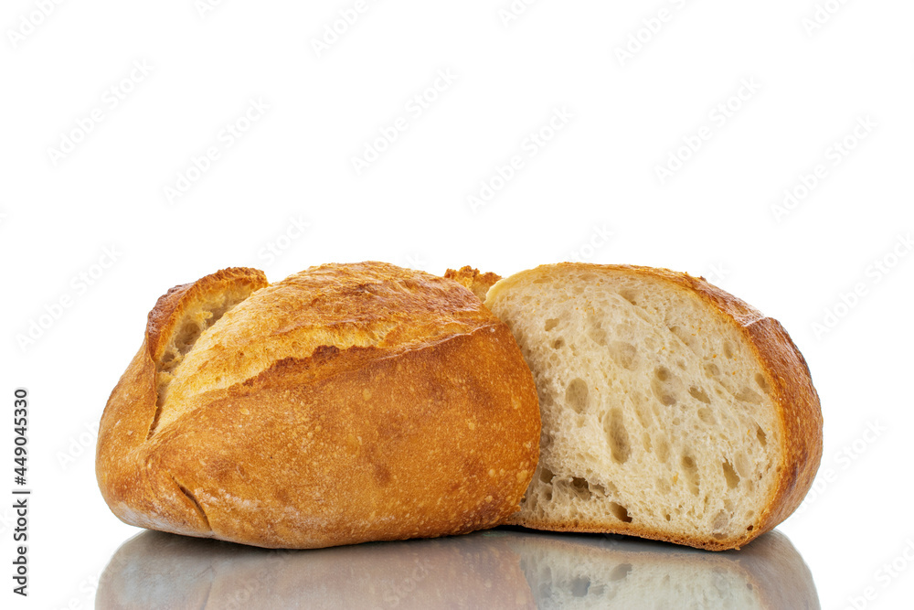 Two halves of fragrant white bread, close-up, isolated on white.