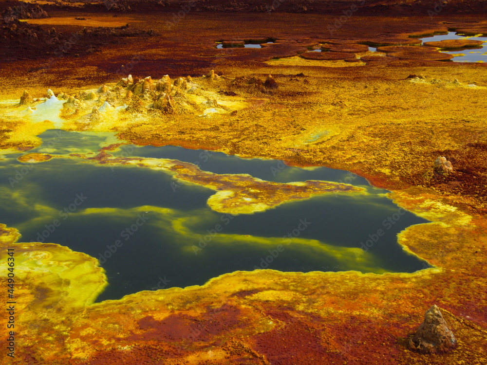 Closeup of bright colorful sulphur springs and rock patterns forming a Mars like landscape Danakil Depression hottest place on earth Ethiopia