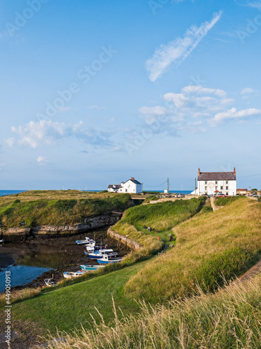 Seaton Skuice harbour with Kings Arms, UK