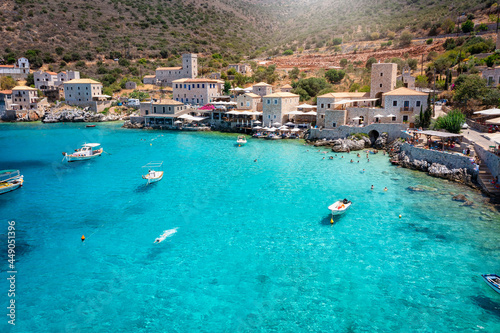 The beautiful village Limeni on the south Mani coast, Peloponnese, Greece, with shining, turquoise sea during summer time