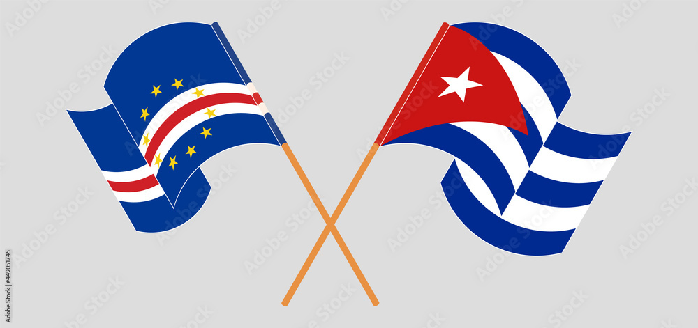 Crossed and waving flags of Cape Verde and Cuba