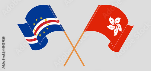 Crossed and waving flags of Cape Verde and Hong Kong