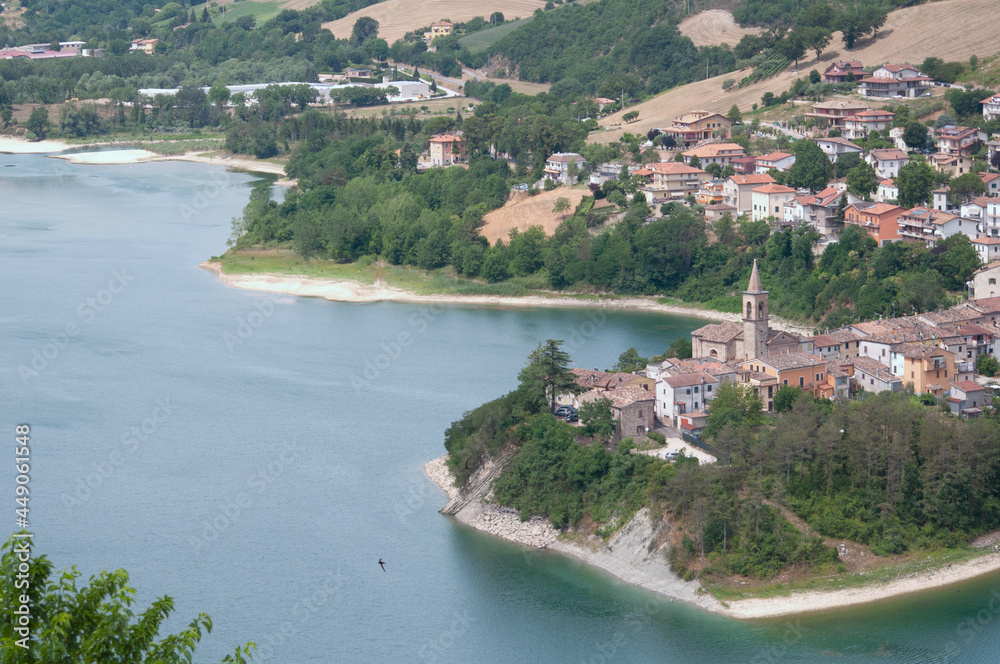 Beautiful landscape of small old town with beautiful lake MERCATALE MARCHE ITALY AT SUMMER