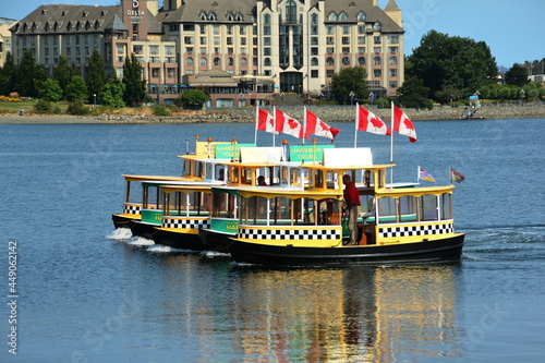 Victoria Harbor ferries on the inner harbor in Victoria BC, Canada. The harbor ferries are a big boost to the tourism industry in Victoria. Come to Vancouver island and explore Victoria.