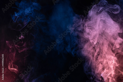 Blue and pink steam on a black background.