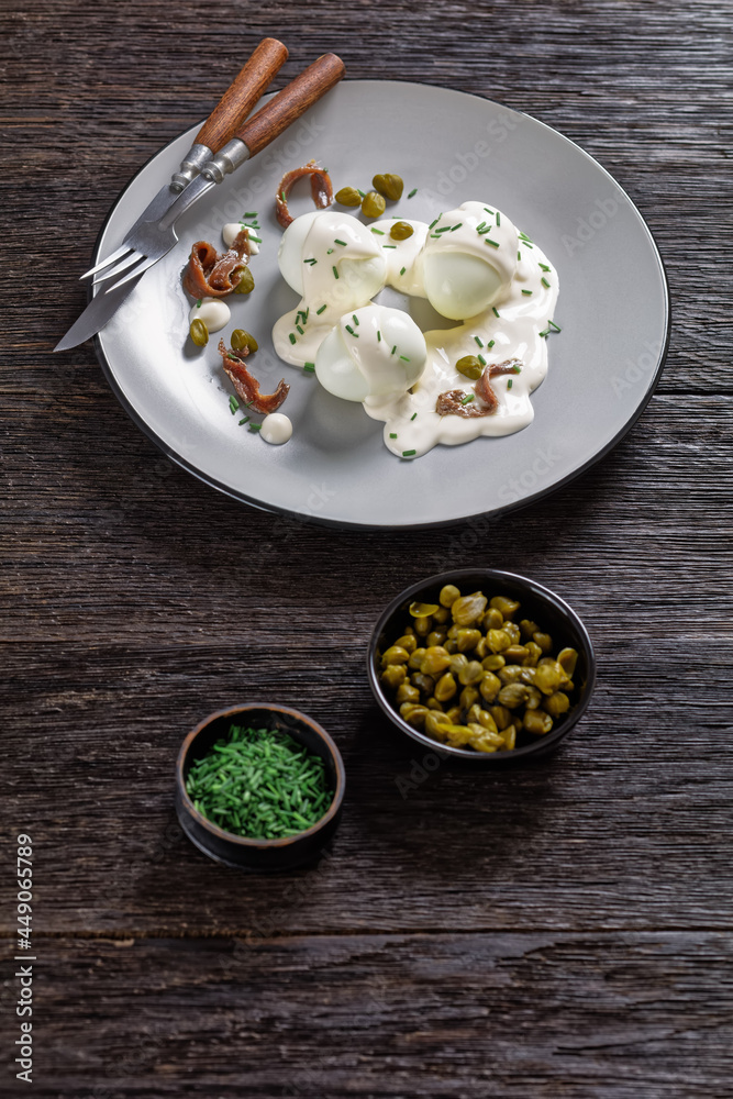 boiled eggs with mayo, anchovy fillets and capers boiled eggs with mayo, anchovy fillets and capers