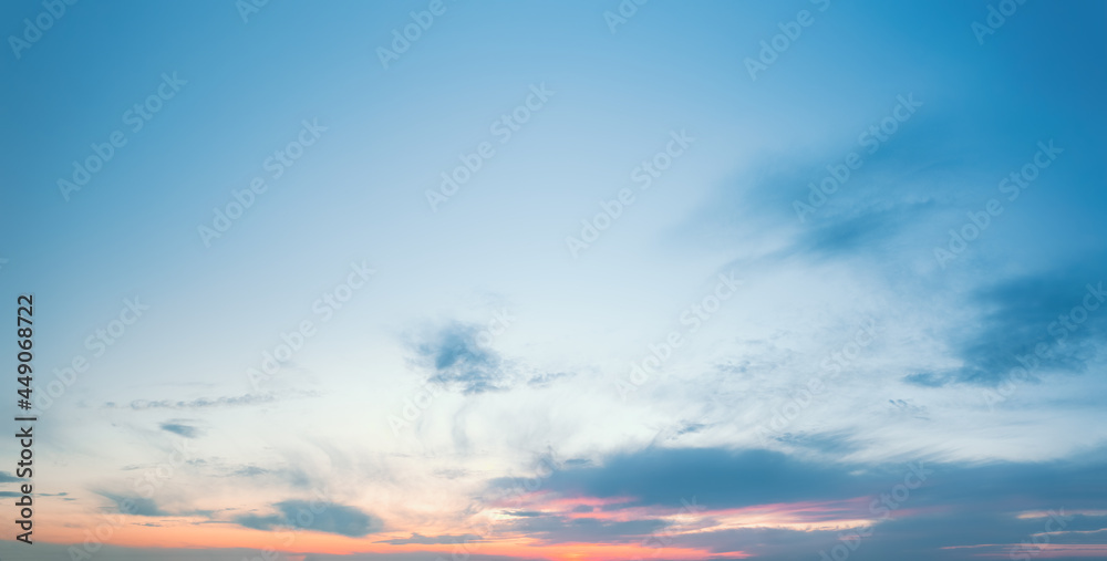 Evening sunset clear sky. Ciling clouds at sunset above horizon. Little cloudy in the evening at sunset. Background to replace the sky.