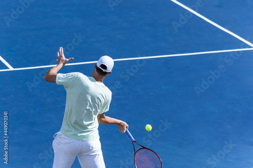tennis player on blue hard court