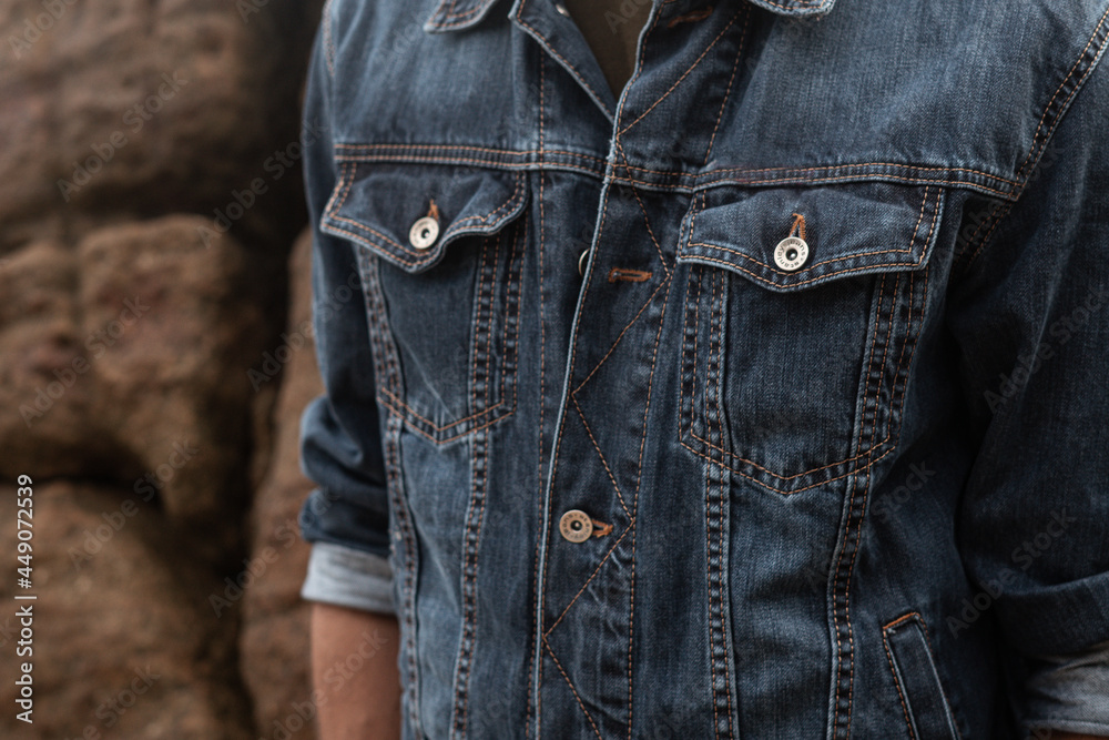 Męska kurtka jeansowa niebieska, zdjęcie reklamowe zbliżenie. Stock Photo |  Adobe Stock