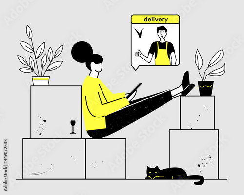 A woman is sitting on boxes, stretching out her legs, preparing to move. Online on a tablet or phone selects and orders the delivery and transportation of things