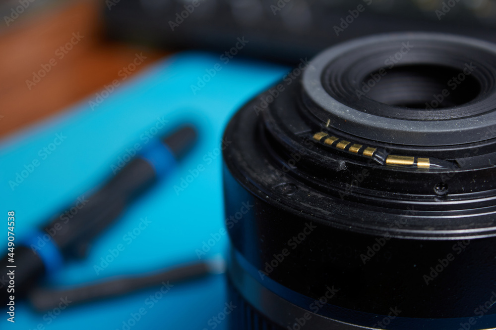 Photo lens with electrical contacts closeup shot closeup