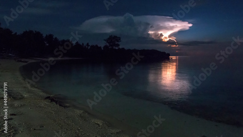 lightning storm over the beach at night