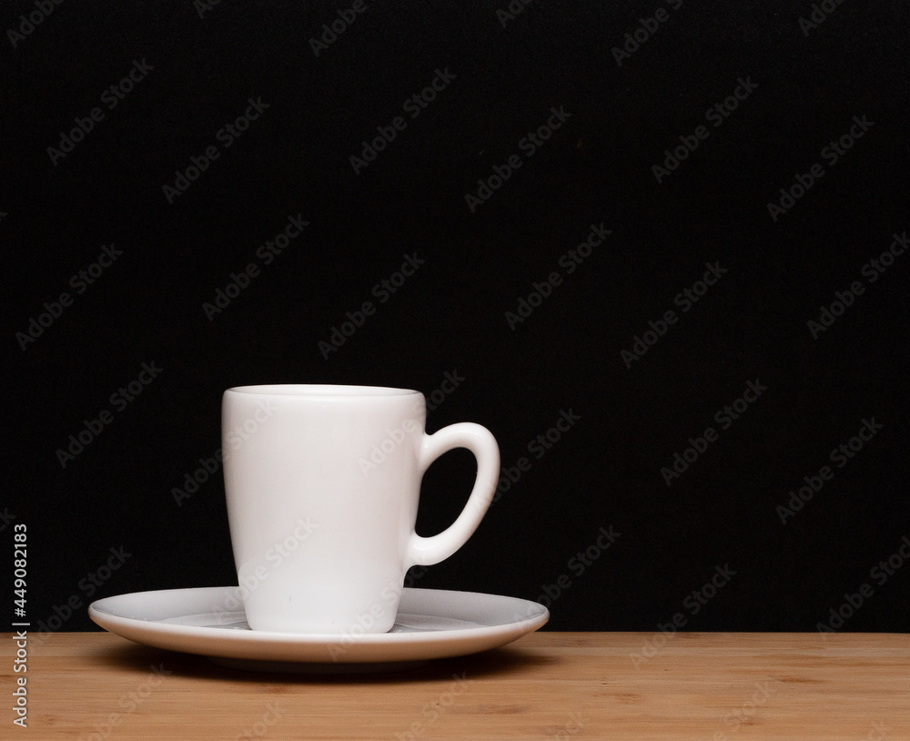 cup of coffe under the wood table cup of coffe under the wood table