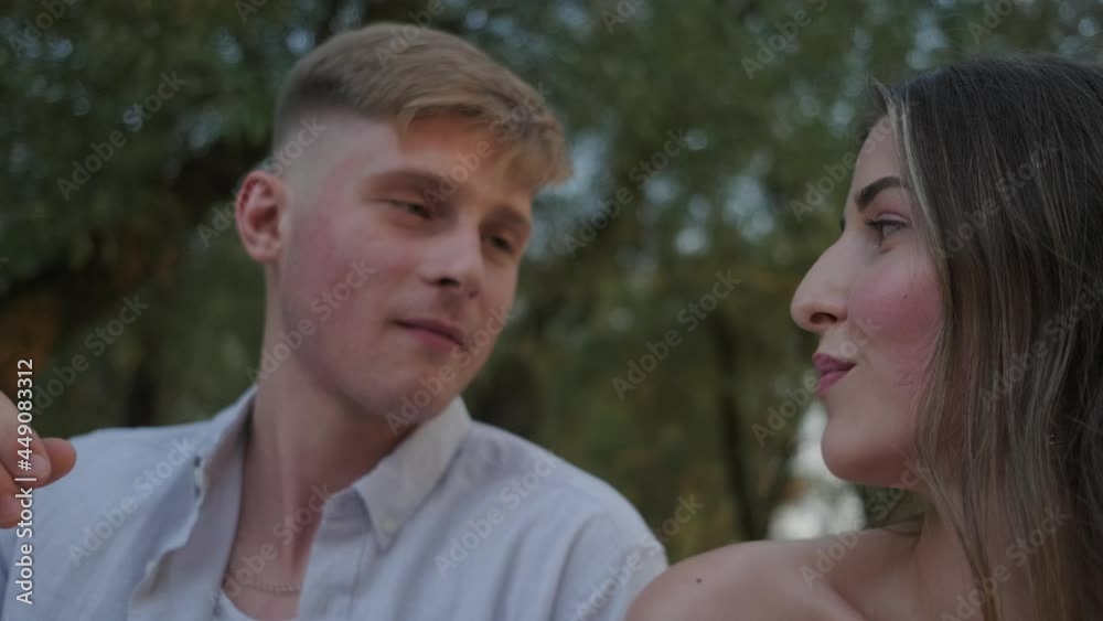 a guy feeds berries to his girlfriend a guy feeds berries to his girlfriend