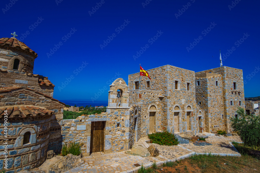 Greek traditional old Orthodox Church and architectural stoned buildings near coastal Mani in Mesenia - Greece