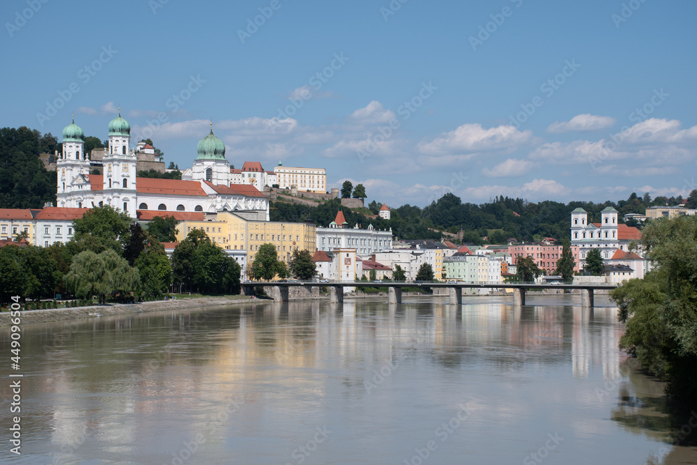 View of the old town of Passau, Germany, along the Inn River, on a sunny summer day