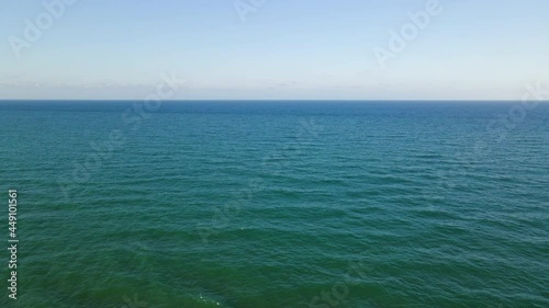 Wallpaper Mural Aerial view of the horizon line of the Mediterranean sea on a clear day with waves coming in. Torontodigital.ca