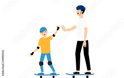 スケートボードに乗って父親とハイタッチする男の子