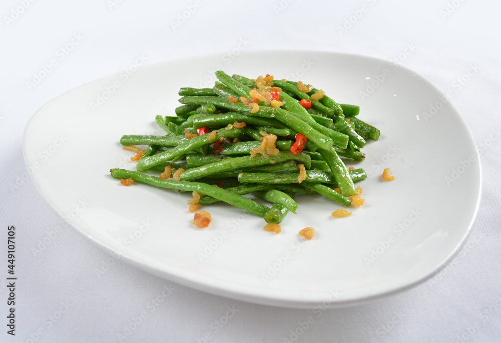 stir fried long green bean vegetables with dried shrimp in soy sauce in white background asian halal menu stir fried long green bean vegetables with dried shrimp in soy sauce in white background asian halal menu