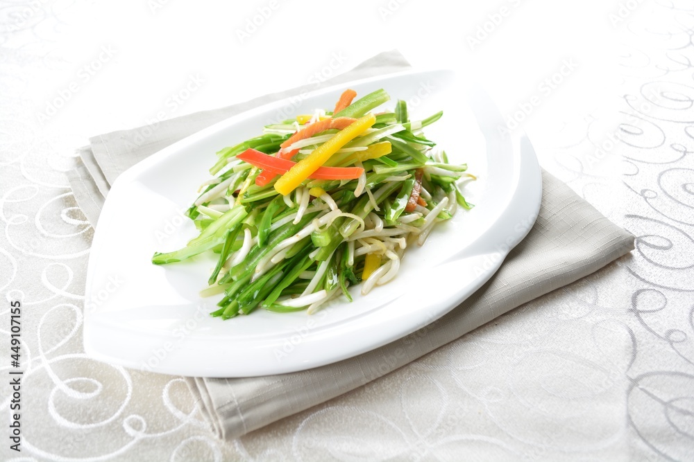 stir fried slices green dragon vegetables in soy sauce in white background asian halal menu stir fried slices green dragon vegetables in soy sauce in white background asian halal menu