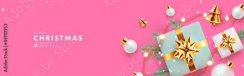 Christmas banner. Xmas background design with realistic gift boxes, golden conical Christmas trees, bauble balls, garland lights. Horizontal christmas poster, greeting card, header for website