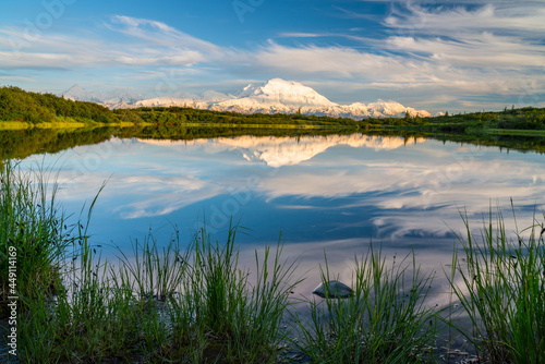 alaska's mount denali reflected in calm Reflecting Pond near Wonder Lake sunset