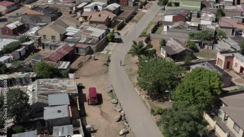 Man runs through Soweto Township, Johannesburg, Gauteng, South Africa