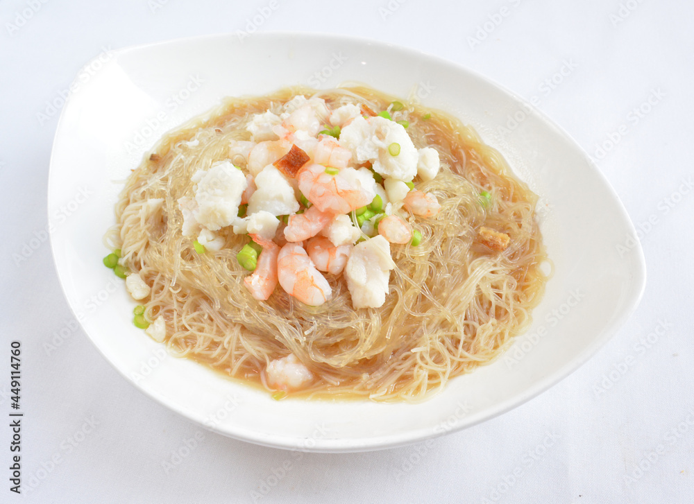 braised seafood bee hoon thin rice noodle in opeh leaf in white background asian halal menu braised seafood bee hoon thin rice noodle in opeh leaf in white background asian halal menu