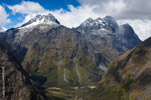 Mt Crosscut (left) and Christina from Homer Saddle, Upper Hollyford Valley, Fiordland National Park, New Zealand photo