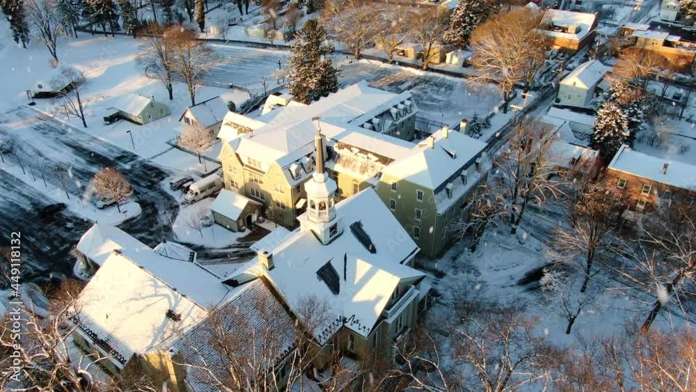 AERIAL Large Snow Covered Building During Snowstorm AERIAL Large Snow Covered Building During Snowstorm