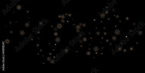 Golden delicate openwork snowflakes scatter on a black background. Festive background, postcard design, wallpaper