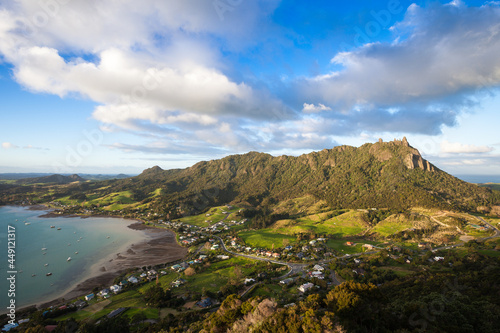 Late afternoon light on Mount Manaia the community of McLeod Bay from Mt Aubrey, Whangarei, New Zealand photo