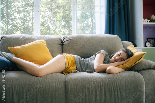 sleepy young woman relaxing...