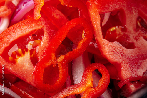Photos Closeup on uzbek achichuk salad with tomatoes and pepper
