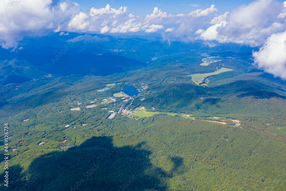 長野県茅野市と北佐久郡立科町にある八ヶ岳連峰の蓼科山をドローンで撮影した空撮写真 Aerial photo of Mount Tateshina in the Yatsugatake mountain range in Chino City and Tateshina Town, Kitasaku County, Nagano Prefecture, taken by drone. 長野県茅野市と北佐久郡立科町にある八ヶ岳連峰の蓼科山をドローンで撮影した空撮写真 Aerial photo of Mount Tateshina in the Yatsugatake mountain range in Chino City and Tateshina Town, Kitasaku County, Nagano Prefecture, taken by drone.