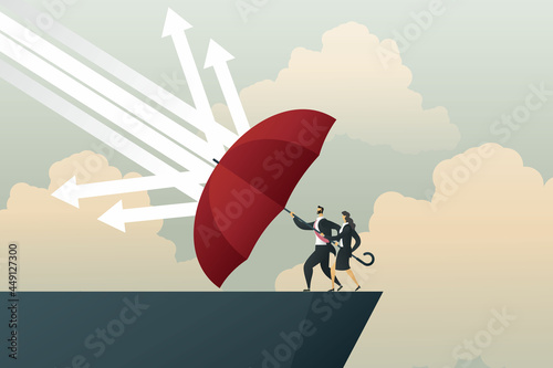 Businessman and Businesswoman with umbrella red protect arrows rain falling on cliff.