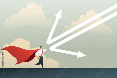 Superhero businessman reflecting a falling arrow graph to protect the economic crisis
