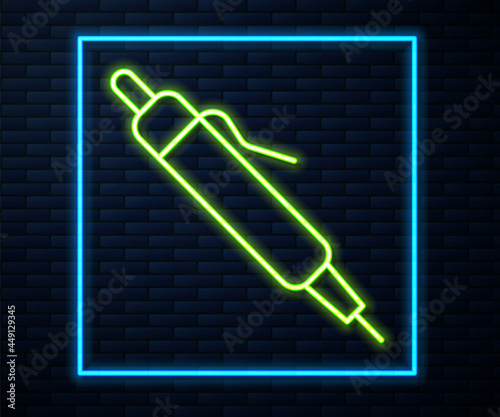 Glowing neon line Pen icon isolated on brick wall background. Vector