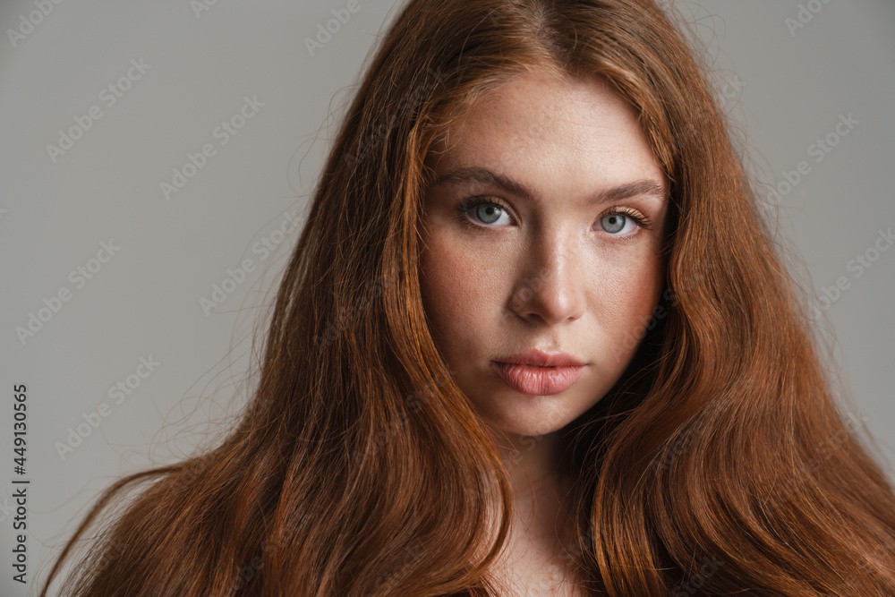 Close up of a young white woman with long red hair Close up of a young white woman with long red hair