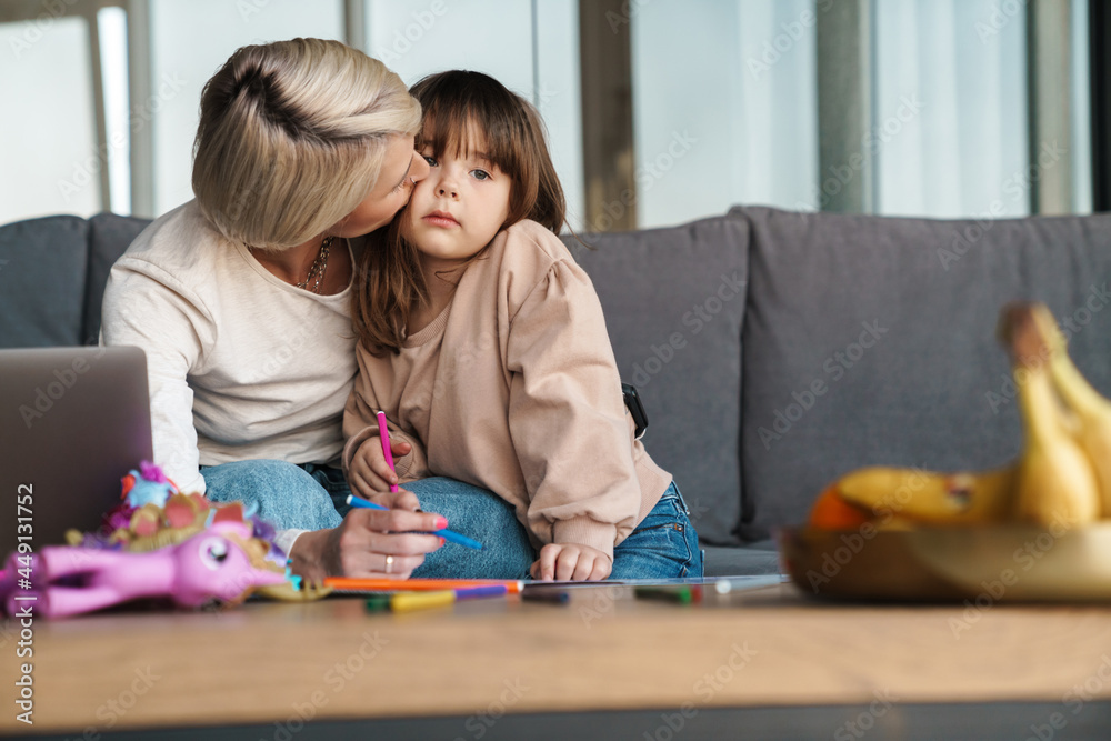 Young mother and her preschooler daughter Young mother and her preschooler daughter