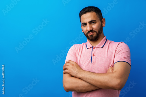 Close up portrait of young arab man in studio