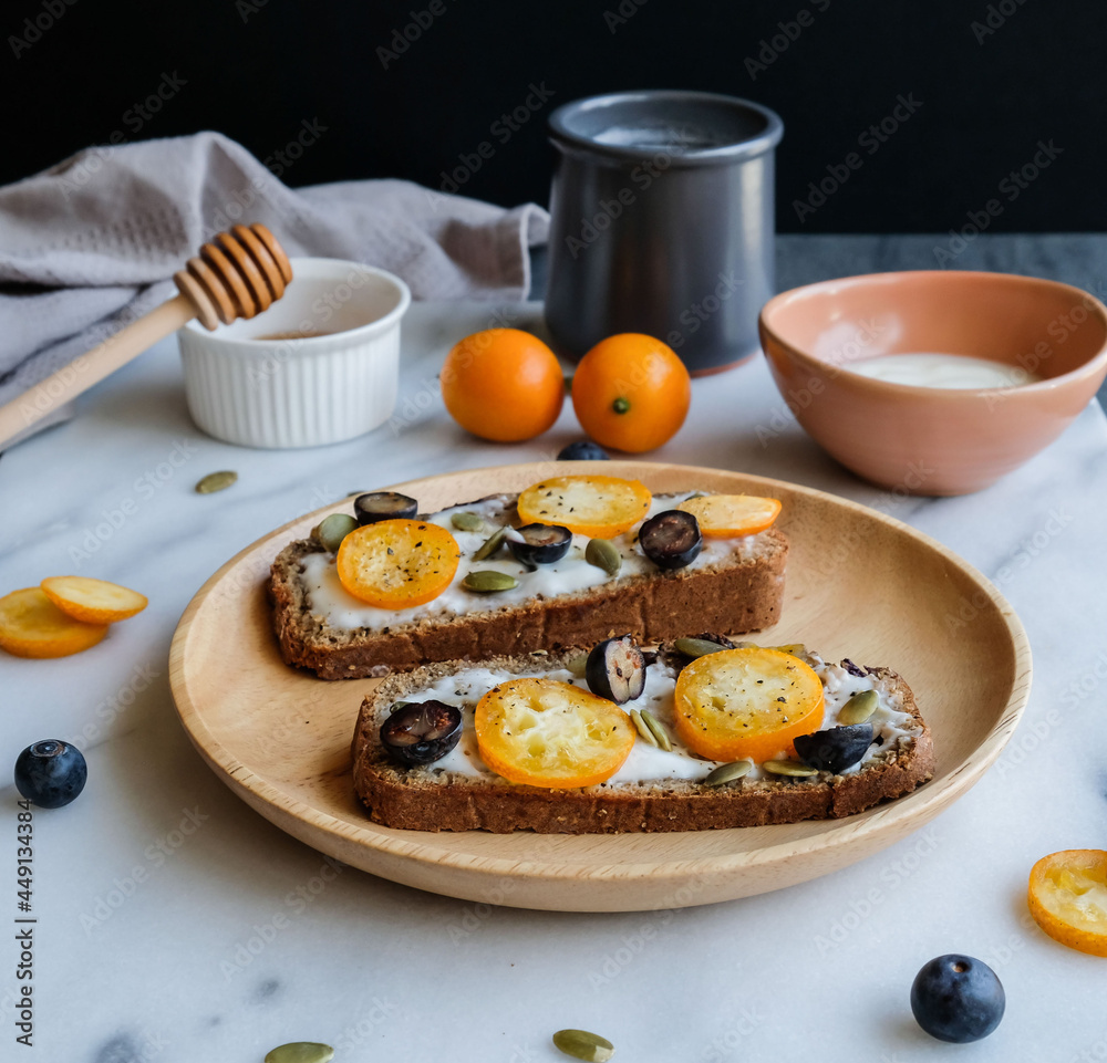Delicious homemade wholemeal bread top with wholesome goodness. Kamquat Yogurt Toast. Ideal for health enthusiast and weight watcher.