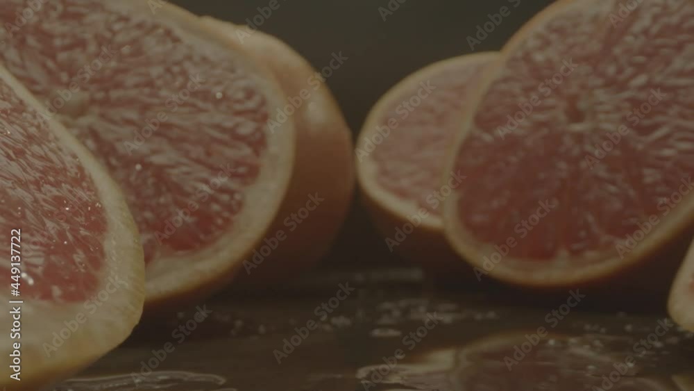 Grapefruit camera push through water dripping Grapefruit camera push through water dripping