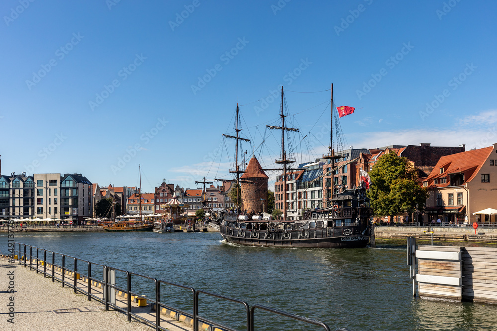  A replica of a galleon as a cruise ship on Motława River in old town of Gdansk