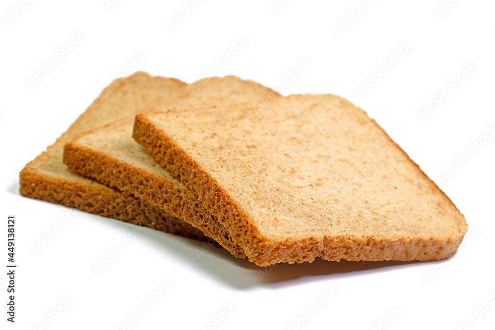 Toastbrot in Scheiben vor weißem Hintergrund Toastbrot in Scheiben vor weißem Hintergrund