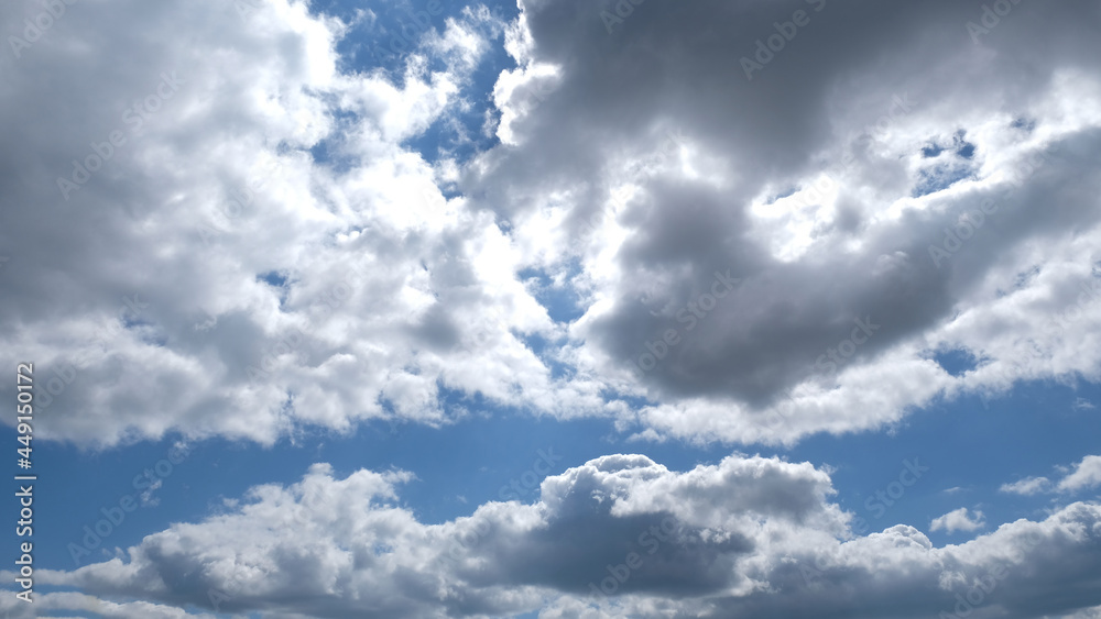 Beautiful blue sky with clouds background. Sky clouds. Air and fluffy clouds in the blue sky on a sunny day, background texture. Copy space. The concept of hope. Beautiful blue sky with clouds background. Sky clouds. Air and fluffy clouds in the blue sky on a sunny day, background texture. Copy space. The concept of hope.