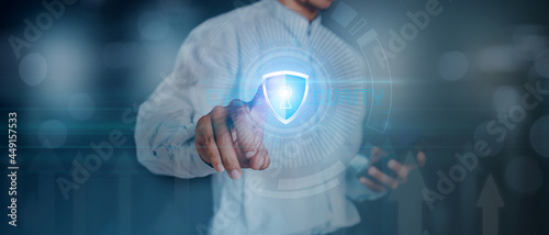 Data or network protection, businessman press shield icon, web button, virus cyber security. Insurance Digital crime by hacker concepts. Information security against viruses, System binary Matrix.